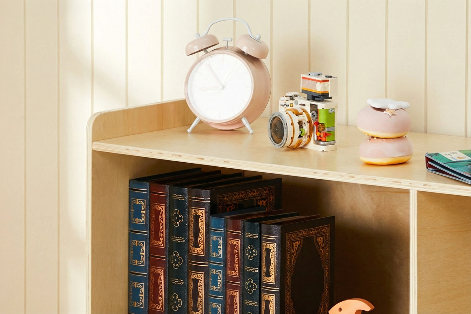 Close-up of wooden Montessori shelf for displaying books and toys